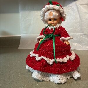 Red and White Crocheted Doll With Hat Green Accents